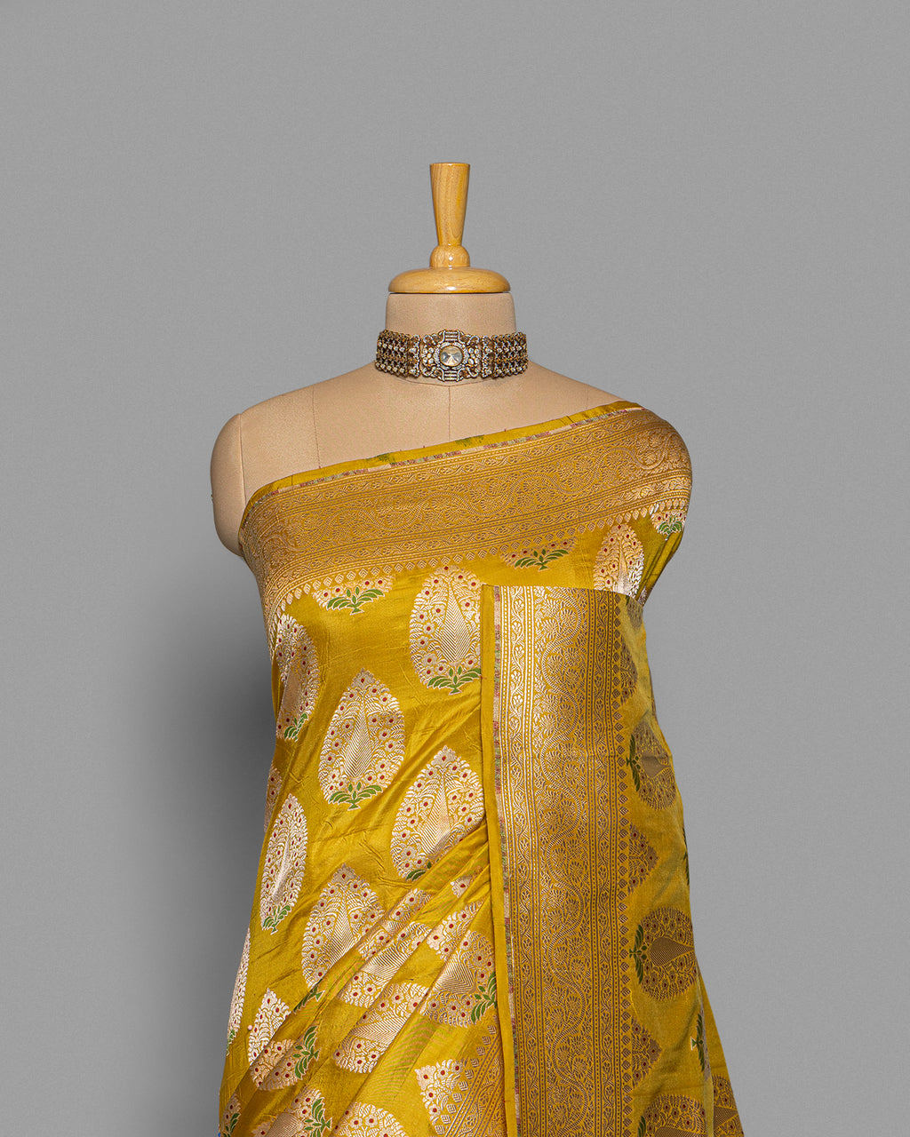 MUSTARD BANARASI SILK SAREE WITH TINCHOI MEENAKARI WORK