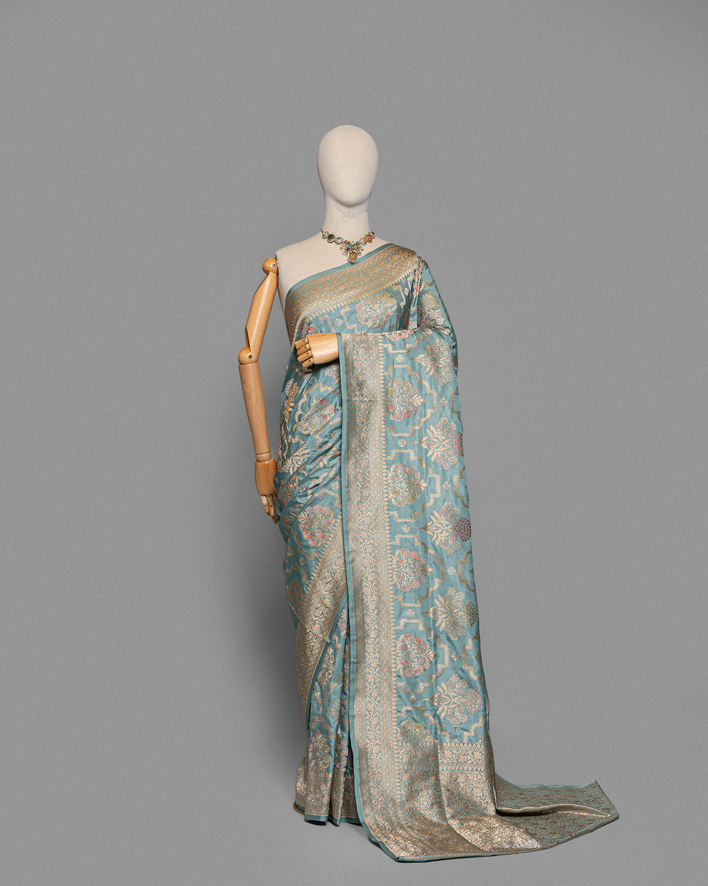 POWDER BLUE BANARASI SILK SAREE WITH TINCHOI MEENAKARI WORK