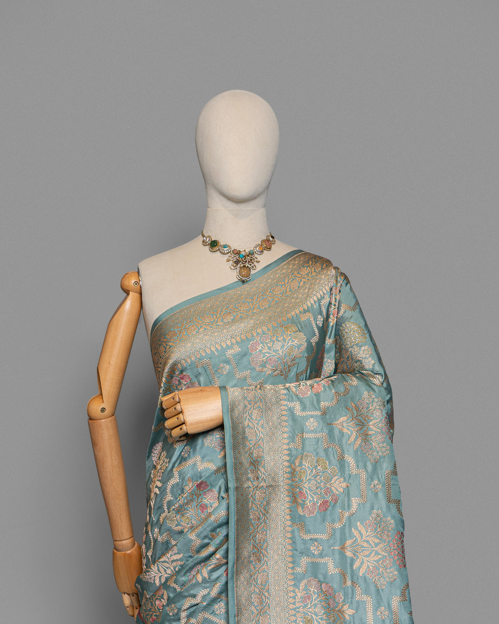 POWDER BLUE BANARASI SILK SAREE WITH TINCHOI MEENAKARI WORK