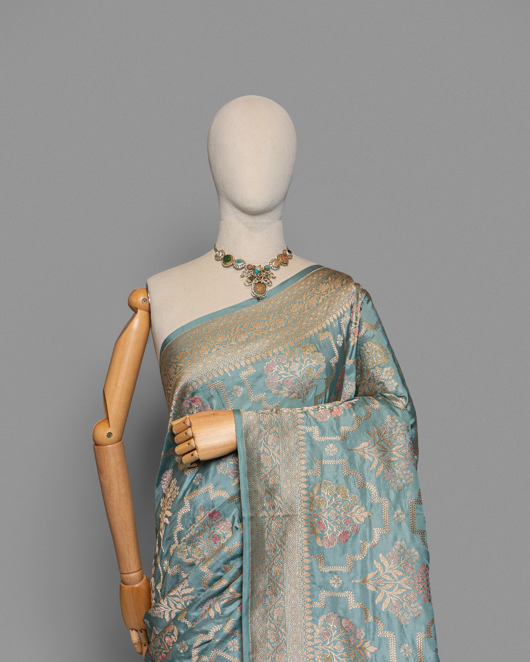 POWDER BLUE BANARASI SILK SAREE WITH TINCHOI MEENAKARI WORK