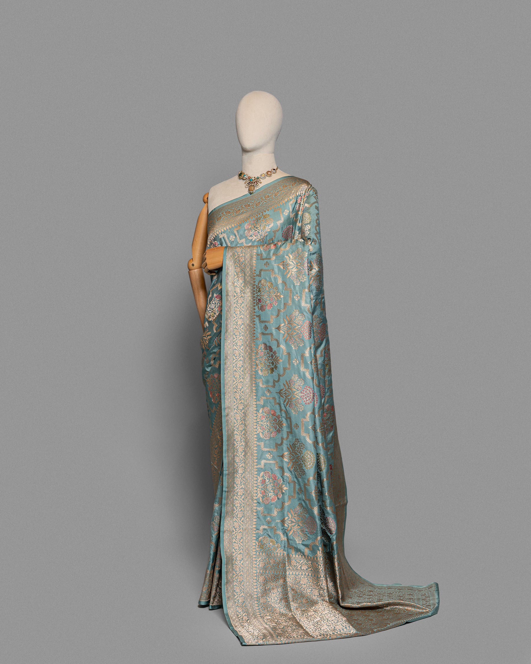 POWDER BLUE BANARASI SILK SAREE WITH TINCHOI MEENAKARI WORK