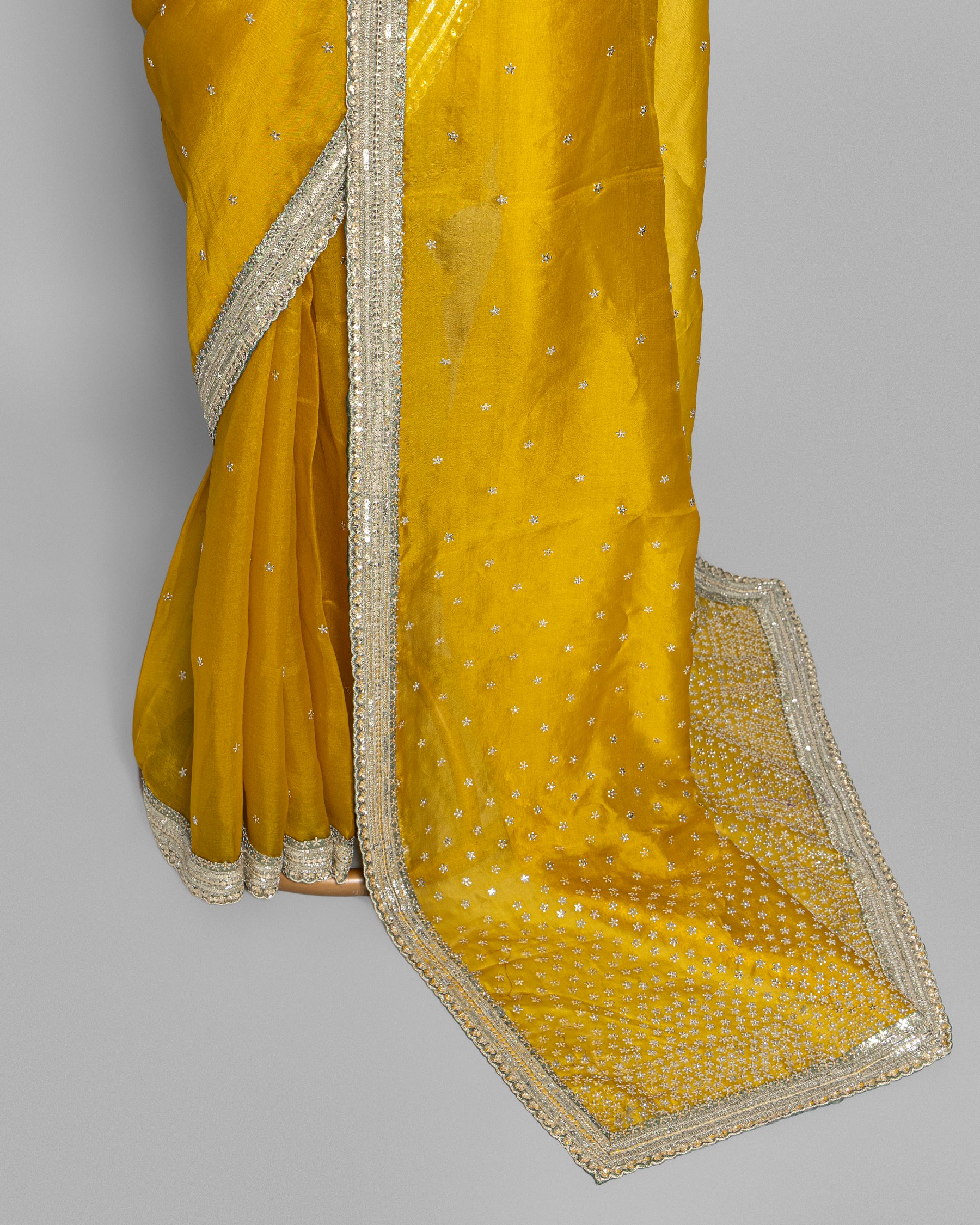 MUSTARD DESIGNER ORGANZA SAREE WITH HAND EMBELLISHMENTS