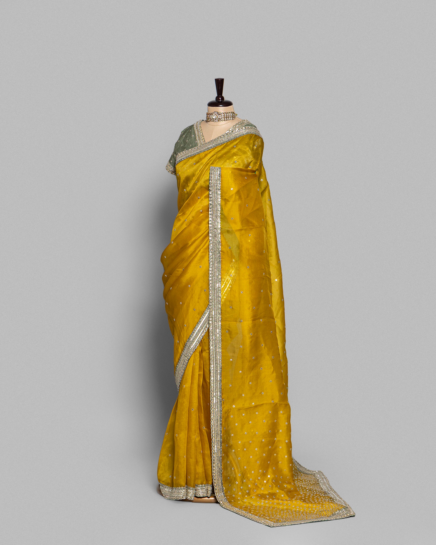 MUSTARD DESIGNER ORGANZA SAREE WITH HAND EMBELLISHMENTS