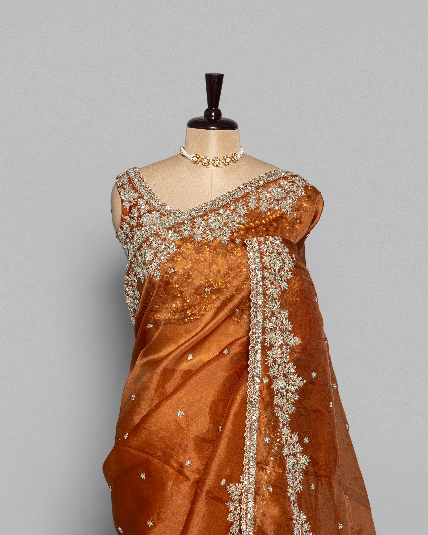 BURNT ORANGE DESIGNER ORGANZA SAREE WITH EMBROIDERED BORDER