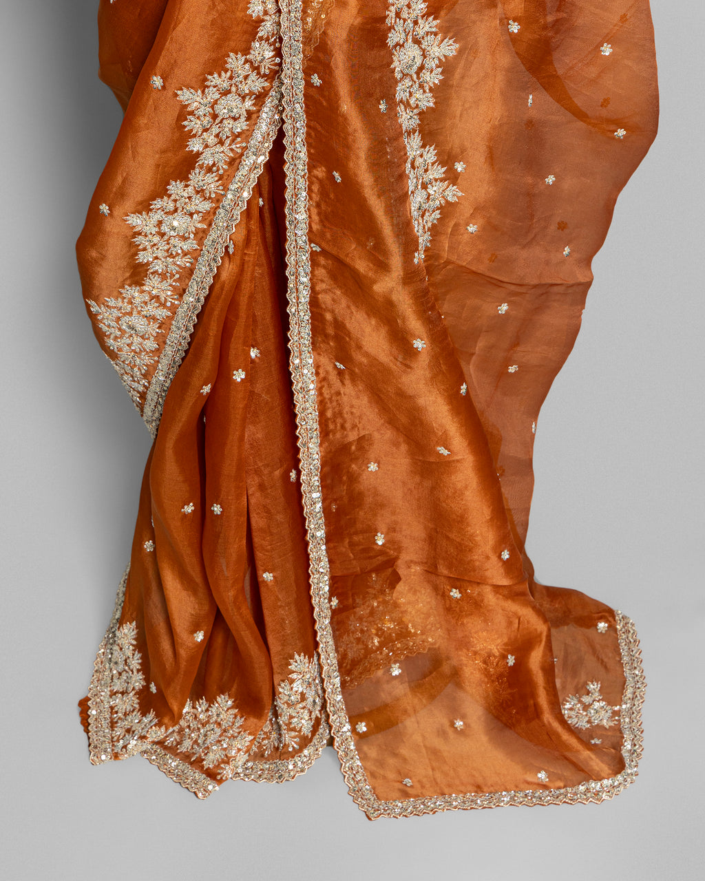 BURNT ORANGE DESIGNER ORGANZA SAREE WITH EMBROIDERED BORDER