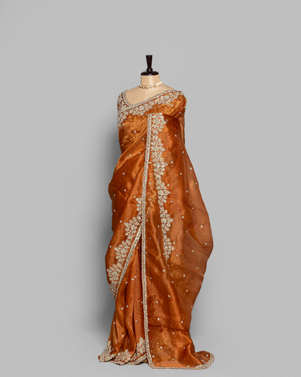 BURNT ORANGE DESIGNER ORGANZA SAREE WITH EMBROIDERED BORDER