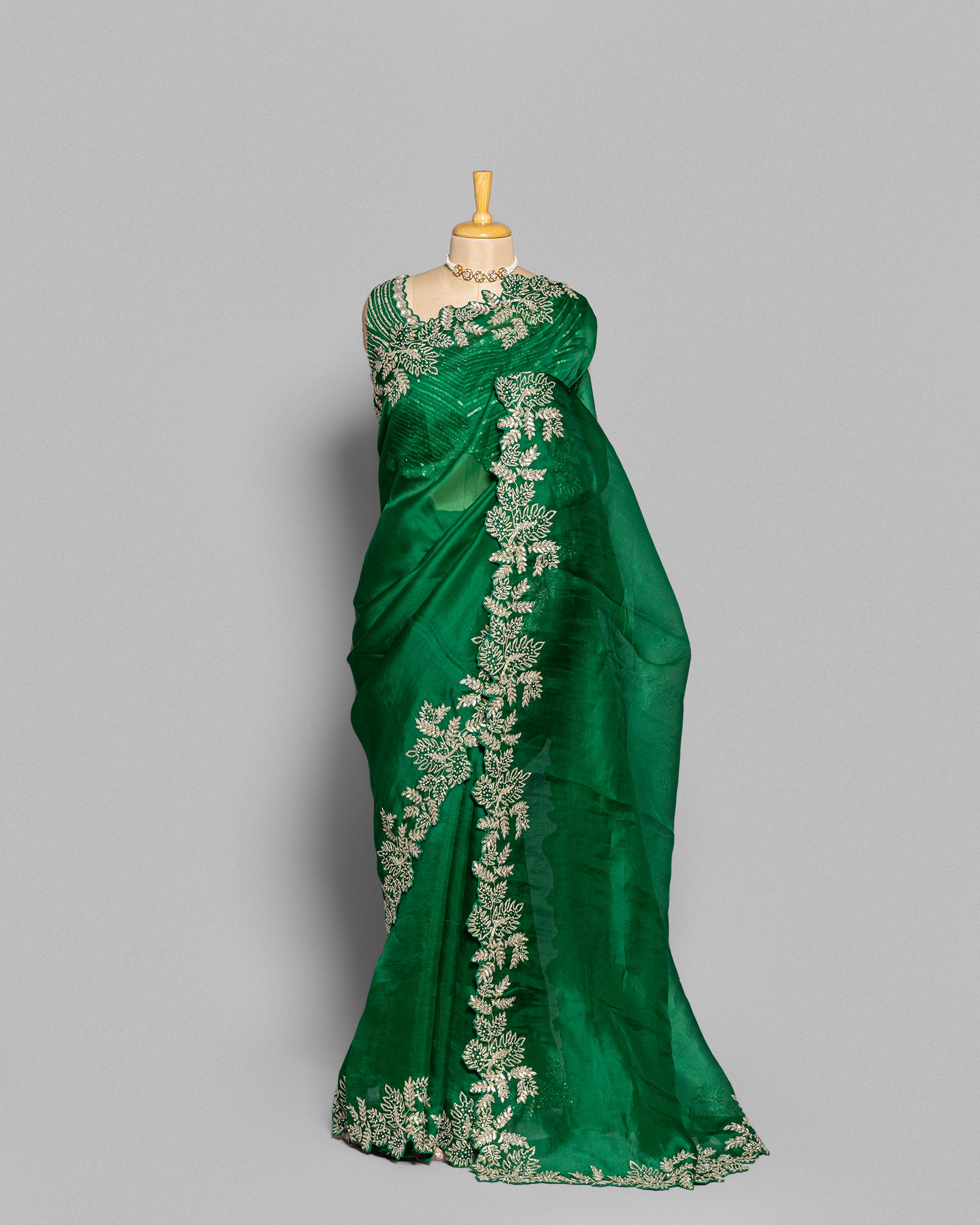 EMERALD GREEN ORGANZA SAREE WITH LEAF EMBROIDERED BORDER