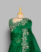 EMERALD GREEN ORGANZA SAREE WITH LEAF EMBROIDERED BORDER