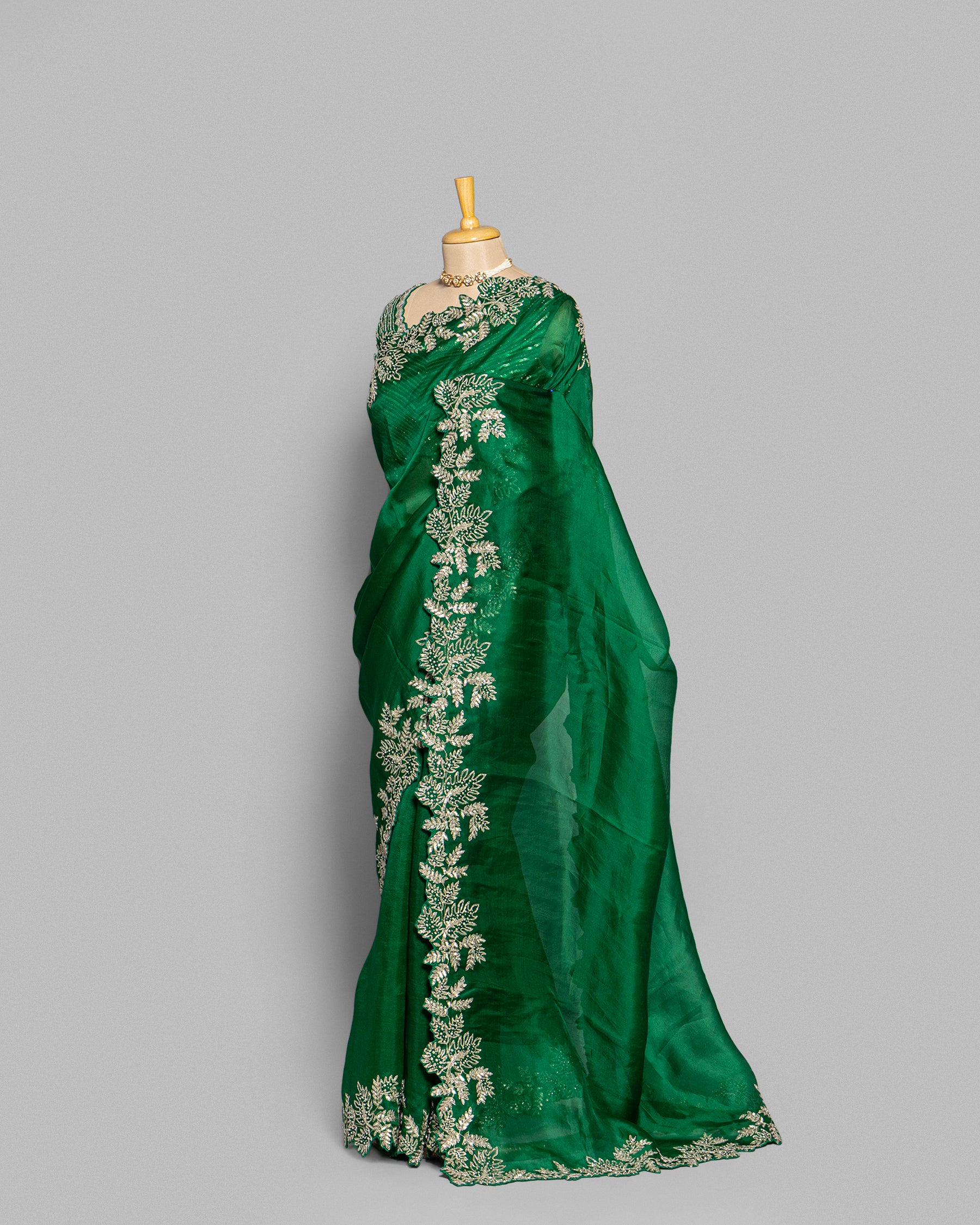 EMERALD GREEN ORGANZA SAREE WITH LEAF EMBROIDERED BORDER