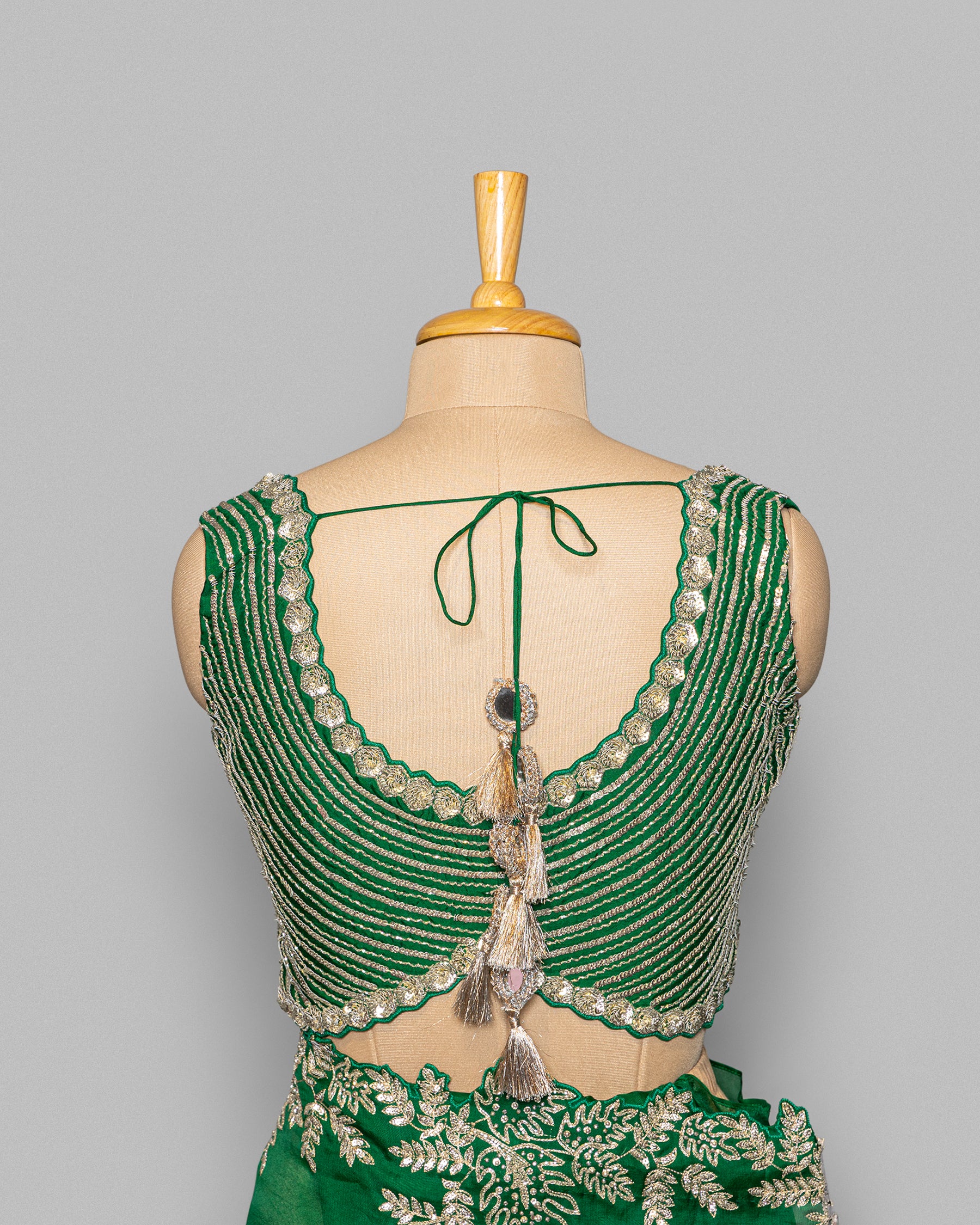EMERALD GREEN ORGANZA SAREE WITH LEAF EMBROIDERED BORDER
