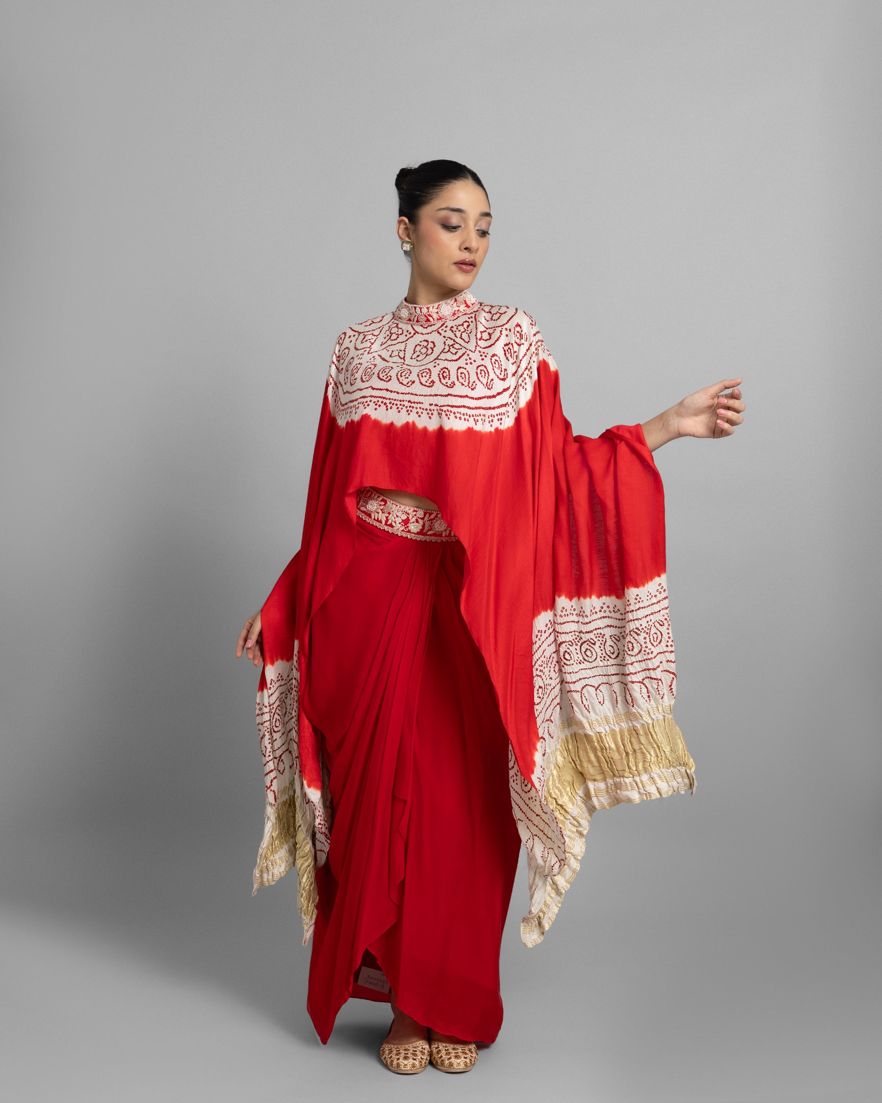 BANDHANI HIGH NECK CAPE WITH COWL SKIRT