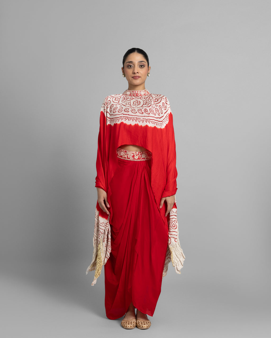 BANDHANI HIGH NECK CAPE WITH COWL SKIRT