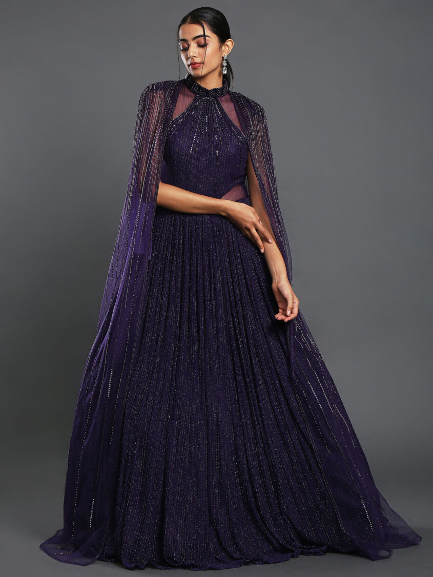 Premium Photo | Beautiful dark skin woman in purple dress in purple room